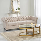 Beige tufted three-seater sofa, adorned with rivets