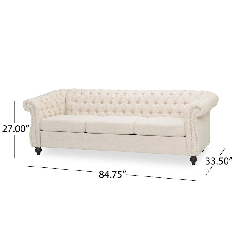 Beige tufted three-seater sofa, adorned with rivets