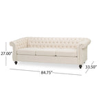 Beige tufted three-seater sofa, adorned with rivets