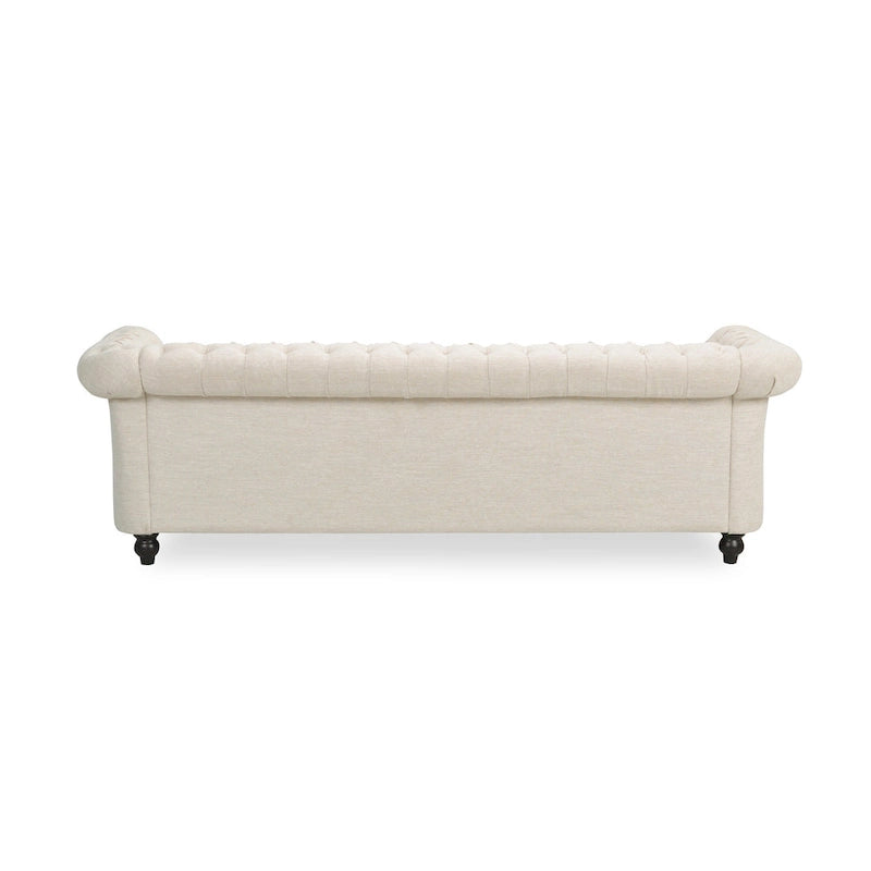 Beige tufted three-seater sofa, adorned with rivets